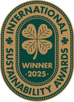 International Sustainability Awards winner badge with a four-leaf clover symbol