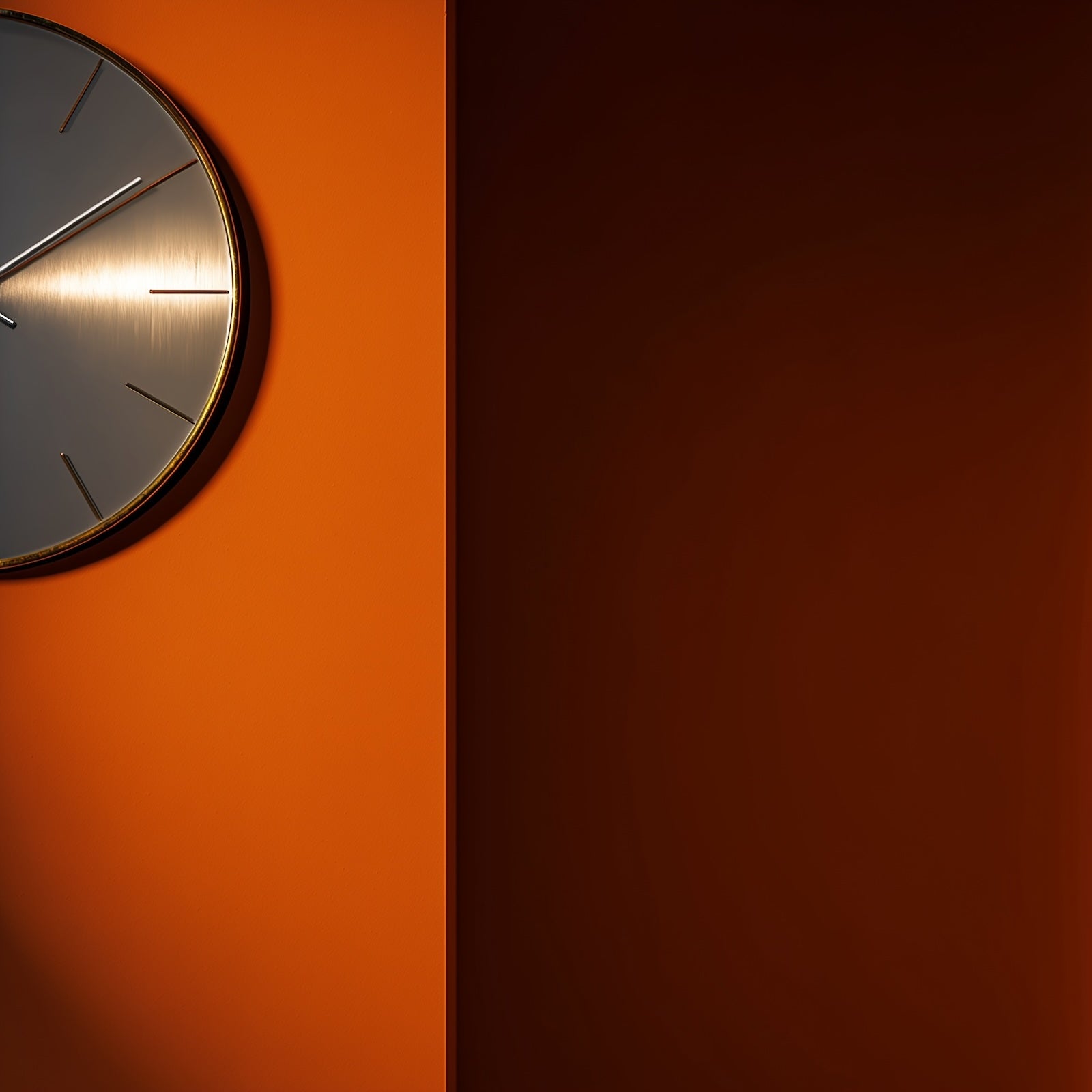 Round wall clock on an orange wall