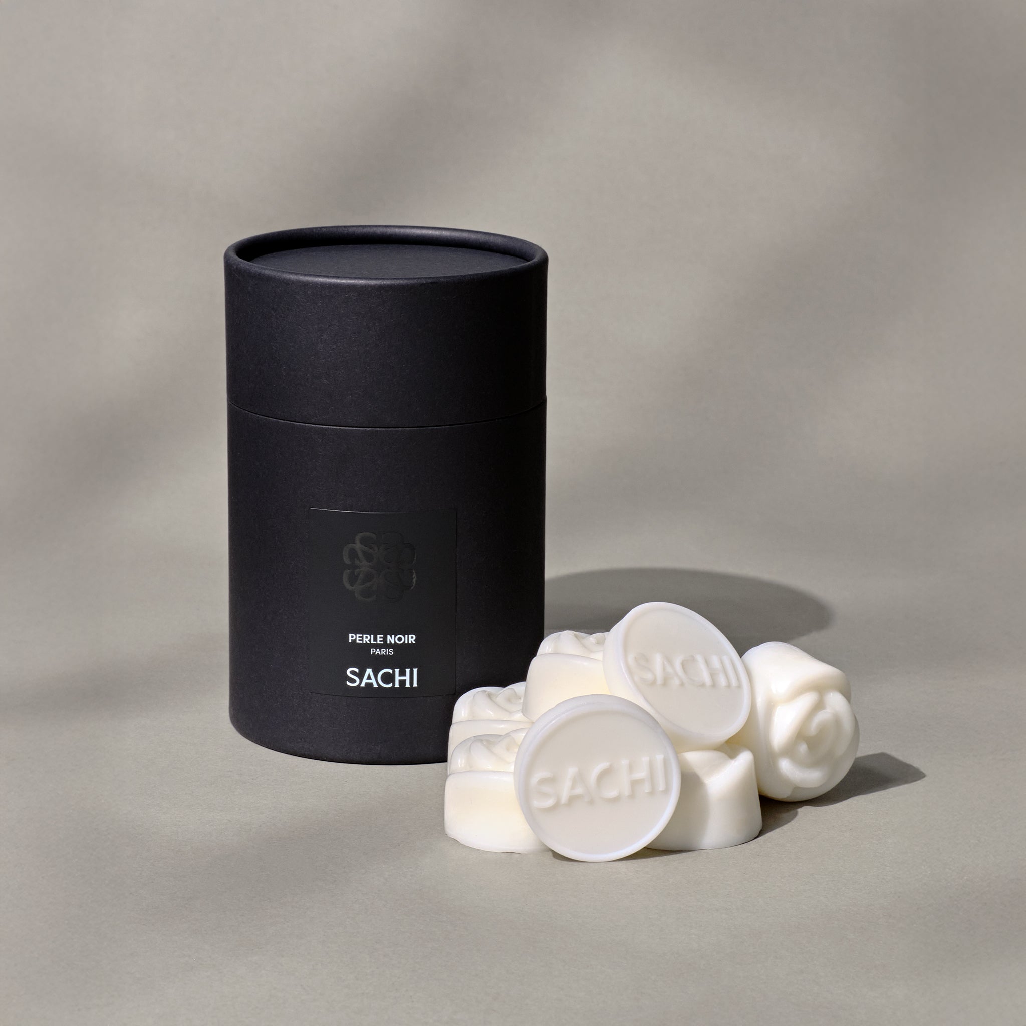 Large ivory wax melts in the shape of roses with a gifting box